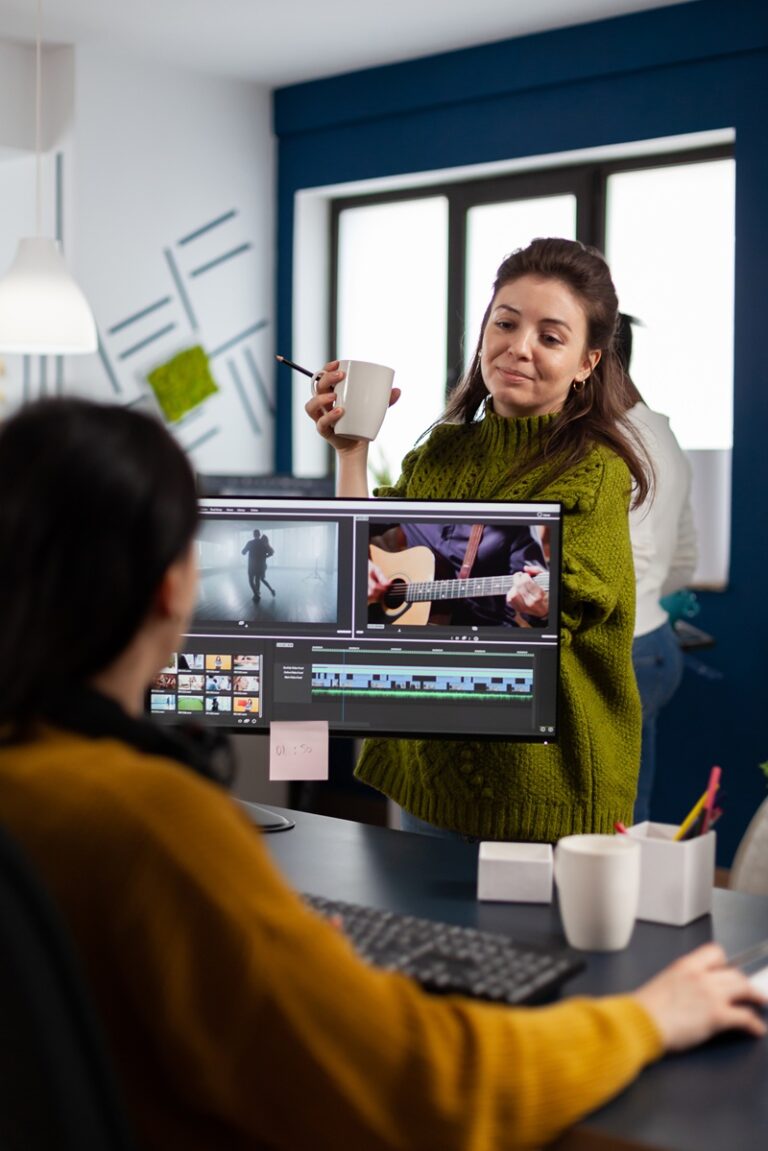 Women videographers editing video project creating content