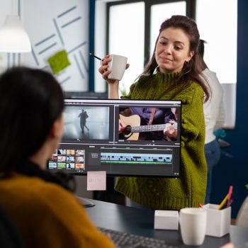 Women videographers editing video project creating content